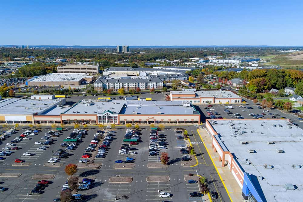 shopping-center-businesses-parking-lot-with-cars