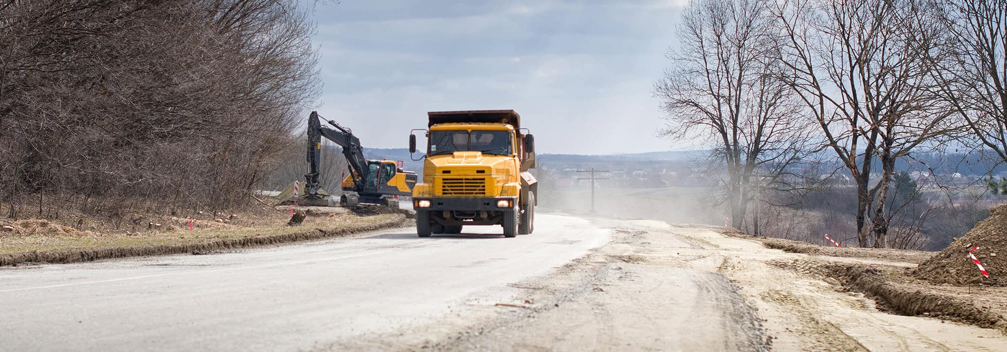 heavy construction vehicles doing road construction