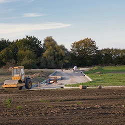 roadway construction in a field